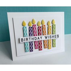 a birthday card with candles on it and the words happy birthday wishes written in different colors