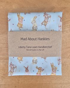 One Delightful Hankie depicting Rabbits. Liberty Hankie, Tim Wunderland , Liberty Tana Lawn.  Intricately captured through pencil crayons, these bunnies are ready for an afternoon of outdoor sports games. Multicoloured balls act as miniature polka dots across the surface of this small-scale design on a pale blue background. My handmade handkerchiefs/pocket squares are suitable for everyone. They can be used as everyday handkerchiefs or decorative accessories. They are soft, strong and machine wa Handmade Handkerchiefs, Liberty Tana Lawn, Pencil Crayon, Scale Design, Pocket Squares, Stocking Filler, Sports Games, Stocking Fillers, Pocket Square