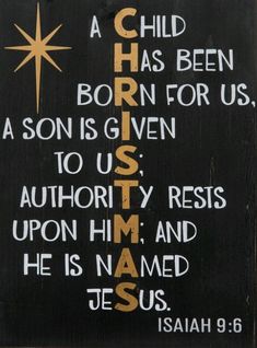 a wooden sign with the words jesus and a star above it that says, a child has been born for us