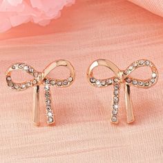 Beautiful Simulated Diamond Bow Rose Gold Toned Stud Earrings. Feminine Yet Classy. Can Be Worn From Morning To Night. These Earrings Will Surely Become Your New Favorite. Bubble Bar, Trendy Bows, Diamond Bows, Bow Jewelry, Coquette Bow, Bow Earrings, Bar Earrings, To Night, Earrings Gold