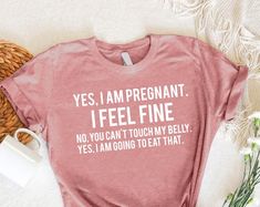 Funny Pregnancy Shirt,New Mom T-Shirt,Mom to Be Gift,Pregnancy Announcement Shirt,Gift For Pregnant,Cute Maternity Shirt,Yes I Am Pregnant. Use this stunning shirt to up your style game. Crafted with great care from premium materials, it seamlessly blends elegance and comfort. This versatile shirt is ideal for both semi-formal and casual settings. Its timeless design exudes sophistication and complements any ensemble with ease. You might redefine your fashion quotient and steal the show with thi I Am Pregnant, Cute Maternity Shirts, Funny Pregnancy Shirts, Cute Maternity, Funny Pregnancy, Pregnancy Announcement Shirt, Maternity Shirt, Pregnancy Humor, Mom To Be