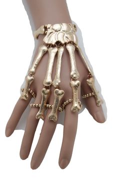 Women Handchain Style : Casual / Trendy Fashion Condition : Brand New Color : Gold metal chains and charms Size: One size - elastic band Wrist size: One size fits all - elastic band Finger Bracelets, Skull Bones, Skeleton Skull, 5 Rings, Fun Fun, Hand Chain, Metal Hand, Skull And Bones, Valentino Studs