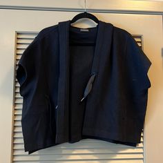 Anthropologie Cropped Short Sleeve Sweater. Navy. Tie In Front. Hood, Pockets And Slit On The Side. Never Worn. Navy Tie, Short Sleeve Sweater, Short Sleeved Sweaters, Sleeve Sweater, On The Side, Anthropologie, Sweaters For Women, Color Blue, Navy