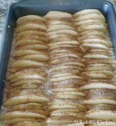 a pan filled with bananas sitting on top of a counter