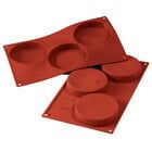 three red trays sitting on top of each other