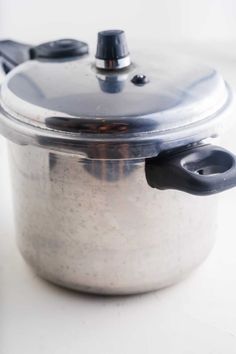 an empty pot on a white counter top