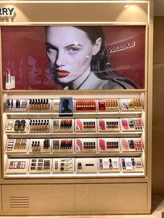 a display case filled with lots of different types of cosmetics