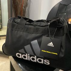 Black And Grey, Fits In Gym Locker, Shoulder Strap, Padded Haul Handle Functional Adidas Gym Bag For Travel, Casual Black Tote Gym Bag, Adidas Casual Travel Gym Bag, Functional Black Adidas Gym Bag, Casual Adidas Gym Bag For Travel, Sporty Black Rectangular Duffle Bag, Adidas Functional Rectangular Bag, Adidas Rectangular Functional Bags, Sporty Rectangular Adidas Bag