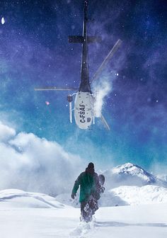 a man walking in the snow with a helicopter flying over him and mountains behind him