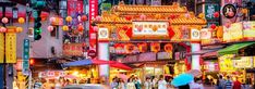 a city street filled with lots of neon signs