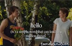 two young men standing next to each other in front of trees with the words hello