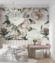 a bedroom with floral wallpaper and white furniture