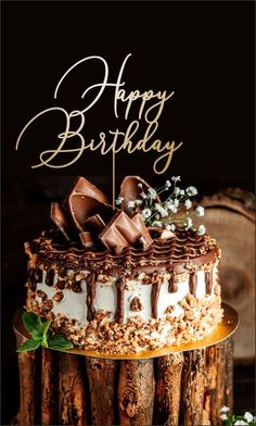 a birthday cake with chocolate and white frosting