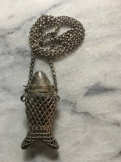 "This is such an unusual fish necklace! It is silver color metal but no markings. The body has a woven basket weave pattern. The fish head opens but does not latch. It is quite large and measures approximately 3\" x 1 1/2\". The chain measures 32\". A unique and fun piece to wear! Thank you for visiting Vintage Great Gets 💕" Fish Wire Necklace, Faucet Necklace, Unusual Fish, Peruvian Jewelry, Fish Head, Scent Perfume, Akoya Pearl Necklace, Fish Jewelry, Fish Necklace