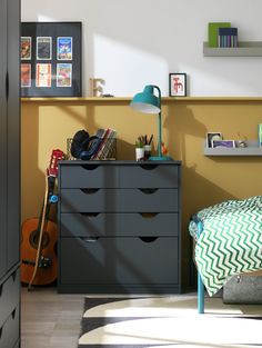 a bedroom scene with focus on the dresser