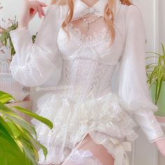 Dandelion Angelcore Lolita Corset with boned support, laced up front, ruffles. Tutu skirt is also available for purchase. Rose pin is not included. Size S Bust 75-95cm Waist 63-66cm Length 38cm Size M Bust 80-100cm Waist 66-70cm Length 39cm Size L Bust 85-100cm Waist 70-74cm Length 40cm Feminine Lace Corset Dress With Ruffles, Fitted Balletcore Corset Dress With Ruffles, Fitted Corset Dress With Ruffles In Balletcore Style, Fitted Ruffled Corset Dress In Balletcore Style, White Lace Corset Dress With Ruffles, White Long Sleeve Corset For Spring, Coquette Ruffled Corset Dress For Costume Party, Spring Costume Party Corset With Ruffles, Spring Corset With Ruffles For Costume Party