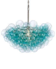 a glass chandelier hanging from a chain