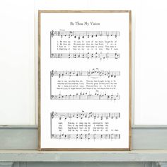 a framed sheet music print with the words be thou my vision