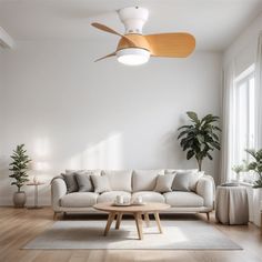 a living room with a couch, coffee table and ceiling fan in the middle of it