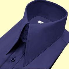 High Long Pointed Collar Tailor-Made On Order shirt 𝘈 𝘸𝘩𝘪𝘵𝘦 𝘩𝘪𝘨𝘩-𝘤𝘰𝘭𝘭𝘢𝘳 𝘴𝘩𝘪𝘳𝘵 𝘪𝘴 𝘢 𝘤𝘭𝘢𝘴𝘴𝘪𝘤 𝘢𝘯𝘥 𝘵𝘪𝘮𝘦𝘭𝘦𝘴𝘴 𝘸𝘢𝘳𝘥𝘳𝘰𝘣𝘦 𝘴𝘵𝘢𝘱𝘭𝘦 𝘵𝘩𝘢𝘵 𝘦𝘹𝘶𝘥𝘦𝘴 𝘴𝘰𝘱𝘩𝘪𝘴𝘵𝘪𝘤𝘢𝘵𝘪𝘰𝘯 𝘢𝘯𝘥 𝘦𝘭𝘦𝘨𝘢𝘯𝘤𝘦. 𝘛𝘩𝘪𝘴 𝘵𝘺𝘱𝘦 𝘰𝘧 𝘴𝘩𝘪𝘳𝘵 𝘧𝘦𝘢𝘵𝘶𝘳𝘦𝘴 𝘢 𝘤𝘰𝘭𝘭𝘢𝘳 𝘵𝘩𝘢𝘵 𝘴𝘵𝘢𝘯𝘥𝘴 𝘶𝘱 𝘢𝘯𝘥 𝘦𝘯𝘤𝘪𝘳𝘤𝘭𝘦𝘴 𝘵𝘩𝘦 𝘯𝘦𝘤𝘬, 𝘱𝘳𝘰𝘷𝘪𝘥𝘪𝘯𝘨 𝘢 𝘳𝘦𝘧𝘪𝘯𝘦𝘥 𝘢𝘯𝘥 𝘱𝘰𝘭𝘪𝘴𝘩𝘦𝘥 𝘭𝘰𝘰𝘬. 𝘛𝘩𝘦 𝘤𝘳𝘪𝘴𝘱 𝘸𝘩𝘪𝘵𝘦 𝘤𝘰𝘭𝘰𝘳 𝘰𝘧 𝘵𝘩𝘦 𝘴𝘩𝘪𝘳𝘵 𝘪𝘴 𝘷𝘦𝘳𝘴𝘢𝘵𝘪𝘭𝘦 𝘢𝘯𝘥 𝘱𝘢𝘪𝘳𝘴 𝘸𝘦𝘭𝘭 𝘸𝘪𝘵𝘩 𝘢 𝘷𝘢𝘳𝘪𝘦𝘵𝘺 𝘰𝘧 𝘴𝘵𝘺𝘭𝘦𝘴 𝘢𝘯𝘥 𝘤𝘰𝘭𝘰𝘳𝘴, 𝘮𝘢𝘬𝘪𝘯𝘨 𝘪𝘵 𝘢𝘯 𝘪𝘥𝘦𝘢𝘭 𝘤𝘩𝘰𝘪𝘤𝘦 𝘧𝘰𝘳 𝘣𝘰𝘵𝘩 𝘧𝘰𝘳𝘮𝘢𝘭 𝘢𝘯𝘥 𝘤𝘢𝘴𝘶𝘢𝘭 𝘰𝘤𝘤𝘢𝘴𝘪𝘰𝘯𝘴. 𝘛𝘩𝘦 𝘴𝘩𝘪𝘳𝘵 𝘪𝘴 𝘵𝘺𝘱𝘪𝘤𝘢𝘭𝘭𝘺 𝘮 Classic Navy Slim Fit Shirt, Navy Classic Slim Fit Shirt, Classic Fitted Navy Dress Shirt, Elegant Navy Office Shirt, Navy Elegant Formal Shirt, Elegant Navy Formal Shirt, Classic Navy Dress Shirt For Formal Occasions, Navy Fitted Dress Shirt For Formal Occasions, Fitted Navy Shirt For Office