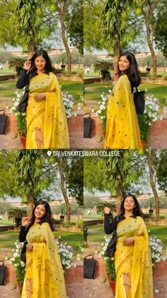 a woman in yellow sari posing for the camera