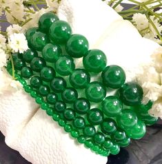 ✦Gemstone: Jade ✦Color: Green ✦Shape: Round  ✦Length: 5''-9'' ✦Bead Size: 4mm 6mm 8mm 10mm 12mm ✦QTY: 1 pc / package ✦✦Please measure your wrist size, then order the bracelet. Jade is a symbol of serenity and purity.  It signifies wisdom gathered in tranquility.  It increases love and nurturing.  A protective stone, Jade keeps the wearer from harm and brings harmony.  Jade attracts good luck and friendship.  It stabilises the personality and promotes self-sufficiency.  Soothes the mind, releasin Jade Color, Jade Bracelet, Coral Beads, Jade Beads, Mens Jewelry Bracelet, Green Jade, Beaded Stretch Bracelet, Stretch Bracelet, Bracelet Gift