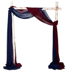 an arch decorated with red, white and blue drapes on top of each other