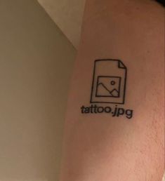 a tattoo that says tattoo jpg on the side of a person's leg