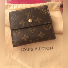 Louis Vuitton/ Monogram Canvas/Wallet/ 100% Authentic/ Can Be Used For: Bills, Checks, Credit Cards, Id, Driver License, There Is A Compartment For Coins//New / Never Used / No Box/ Dust Bag Like On Pic, Not From This Item But Lv Dust Bag/ Luxury Wallet In Monogram Canvas, Elegant Bags In Monogram Canvas With Card Slots, Elegant Monogram Canvas Bag With Card Slots, Elegant Monogram Canvas Bags With Card Slots, Monogram Canvas Wallet With Original Box For Everyday Use, Elegant Monogram Canvas Wallets For Everyday Use, Designer Gold Bifold Bag, Classic Wallet In Monogram Canvas With Original Box, Classic Monogram Canvas Wallet