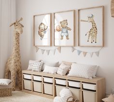 a nursery room with stuffed animals on the wall