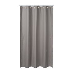 a gray shower curtain hanging on the side of a wall