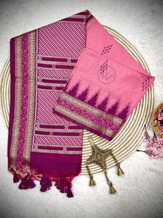 Fabric Details : Elevate your style with our Flamingo Pink Premium Raw Silk Saree. The perfect blend of traditional and modern, this saree is made from premium quality raw silk. The vibrant flamingo pink color will add a touch of elegance to any occasion. Get ready to turn heads with this stunning saree. Saree Color : Flamingo Pink Saree Work : Thread Woven Saree Length : 5.5 Meter Blouse Length : 0.8 Meter Wash : Dry Clean Product color may little differ as per the brightness or color settings of your device. Pink Slub Silk Sets For Eid, Unstitched Pink Slub Silk Salwar Kameez, Pink Slub Silk Dupatta For Designer Wear, Pink Cotton Silk Sets For Wedding, Pink Cotton Silk Wedding Set, Pink Unstitched Slub Silk Sets, Pink Slub Silk Saree Set, Festive Pink Tussar Silk Kurta, Unstitched Pink Cotton Silk Traditional Wear