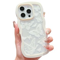 a woman's hand holding an iphone case with butterflies on it