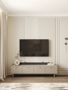 a flat screen tv mounted to the side of a wall