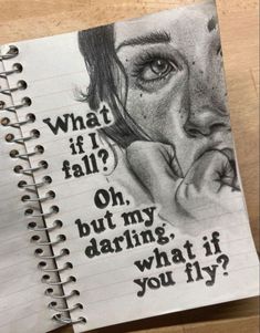 a notebook with an image of a woman's face and words written on it