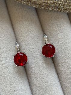 Costume earrings. Classic style, silver plated, with lovely red and clear CZs. These are a lovely addition to any outfit. 16mm x 14mm Everything is stainless steel. Comes in a drawstring bag. Earrings Classic, Costume Earrings, Cz Jewelry, Cz Earrings, Drawstring Bag, Halloween Shopping, Jewelry Sets, Etsy Earrings, Silver Plated