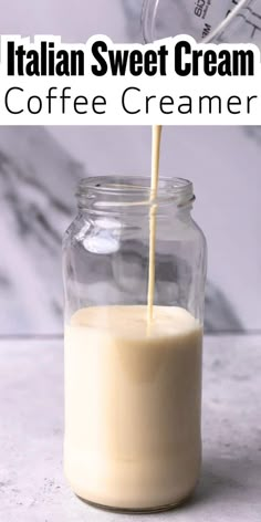 coffee creamer being poured into a glass jar