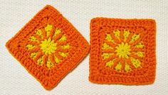 two orange crocheted squares sitting next to each other