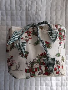 a white bag with christmas decorations on it