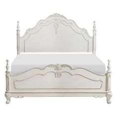 a white bed with an ornate headboard and foot board is shown against a white background