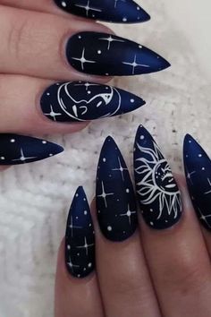 18 Stunning Blue and Black Nails Designs for a Bold Statement - ReenaSidhu Nail Ideas Acrylic Matte, Blue Witchy Nails, Raven Nails Designs, Blue Black Nails Design, Sun And Moon Nails Design, Sailor Moon Nails Acrylic, Black Moon Nails, Black And Blue Nail Designs