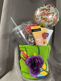 Give me Mom a beautiful Mother's Day gift!!  She will absolutely love this! We've been waiting for these summer months and now they're here!!   This beach Gift includes: -Beautiful beach towel  -Neutrogena Sun Block -Aloe lotion for after fun in the Sun  -Package of licorice  -Double walled drink cup with straw -Hair scrunci or head band  -Lip balm -Mother's Day balloon - Artificial flower to wrap up Beach Towel Mothers Day Balloons, Sun Block, Relax Spa, Beach Gifts, Sunscreen Lotion, Sun Beach, Spa Kit, Fun In The Sun, Cup With Straw