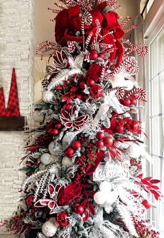 a christmas tree with red and white decorations