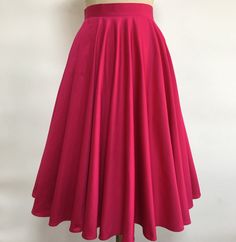 1950s style Full Circle Skirt Details: * Quality Cotton with spandex * Two side pockets * Standard Knee Length  from waist to Hem  28 inch approx Sizes -------Waist (inch） 00        --     24           0          ---    25            2           --     26              4           --    27          6          --     28            8          --     29          10         --    30           12        --     31.5 14          ---   33 16          ---   35.5 18          ---   38 20        ---   40.5 22        ---    43 24       ---     45.5      Don't hesitate to inquire about custom orders; we're more than happy to accommodate your requests. Fitted Solid Skirt With Pockets, Box Pleat Skirt For Party, Party Fitted Box Pleat Skirt, Fitted Box Pleat Party Skirt, Fitted Box Pleat Skirt For Party, Fitted Box Pleat Midi Skirt, Fitted A-line Bottoms With Box Pleat, Fitted Flared Skirt With Box Pleat, Fitted Long Skirt With Box Pleat