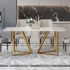 a white marble dining table with gold legs