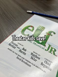 the theater kids save program is being displayed on a table with pencils and paper