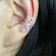 "This unique ear cuff is handmade using sterling silver, or copper. Free US shipping. Customers who purchase this item said: \"Lovely ear cuffs. I look forward to giving these to my daughter as a birthday present. Thank you! \" \" I love everything very much!\" The price include one piece of the ear cuff. If you need a pair, please order two pieces. ;-) Enter my shop here: http://www.etsy.com/shop/AniDesignsllc?ref=pr_shop_more ;-) My contact number: 626-379-1904. Please contact me if you would Adjustable Pierced Ear Climbers As Gift, Adjustable Ear Climbers As A Gift, Adjustable Hypoallergenic Ear Cuff As Gift, Unique Adjustable Nickel-free Ear Climbers, Elegant Sterling Silver Ear Cuff Gift, Hypoallergenic Adjustable Wrap Earrings For Gift, Elegant Handmade Cartilage Earrings As Gift, Sterling Silver Pierced Ear Climbers As Gift, Sterling Silver Ear Cuff As A Gift