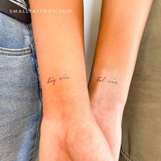 two people with matching tattoos on their arms