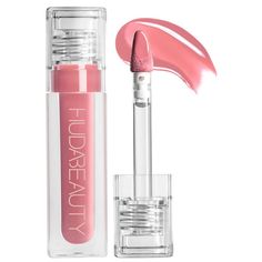 What it is:A hydrating, non-sticky lip gloss for high-shine lips that visibly smooths and blurs fine lines.Formulation Type:Lip GlossBenefits:Hydrating and MoisturizingHighlighted Ingredients:- Vegan Collagen: Smooths the look of lip lines.Ingredient Callouts: Free of sulfates SLS & SLES.What Else You Need to Know: The hydrating, fine-line smoothing formula melts onto the lips with a non-stick, reflective glass-like' finish. Packed with lip-loving, active ingredients like vitamin E and infused w Lip Cuffs, Huda Beauty Lip, Shine Lip Gloss, Vegan Collagen, Lip Contouring, Sephora Beauty, Lip Lacquer, Celebrity Makeup Artist, Lip Fillers