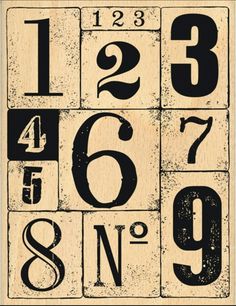 a wooden block with numbers and letters on it, in black and white inks